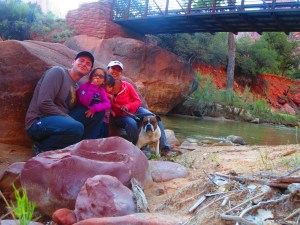 goofy self timer family photo, dog is looking forward
