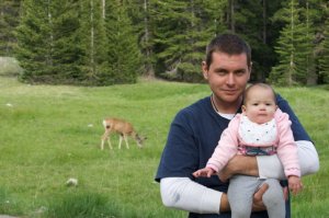 yes, that's deer in the meadow behind Daddy holding baby Marley, the meadow just a few feet from our tent. 