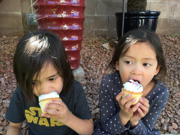 my kids eating cupcakes